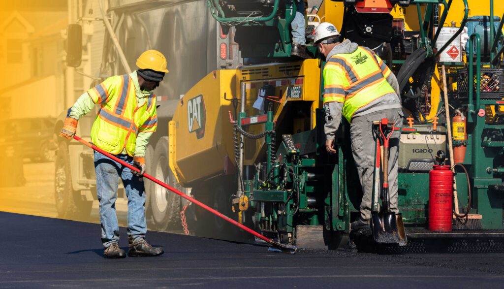 Earle American workers wearing proper safety equipment on job site