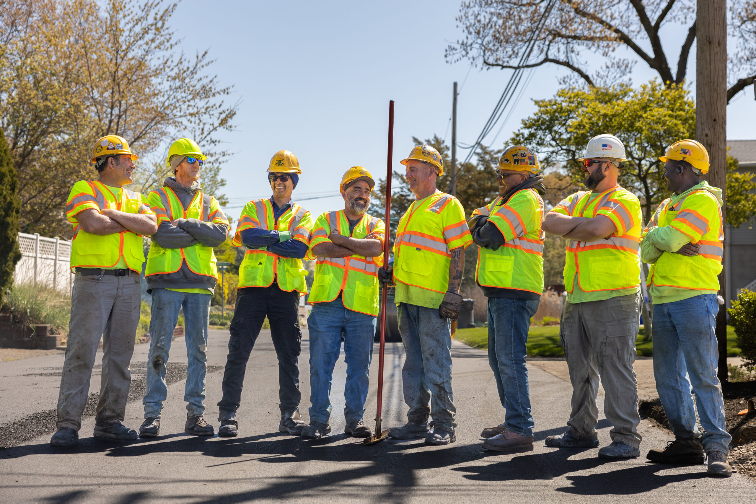 Earle American team members smiling at job site