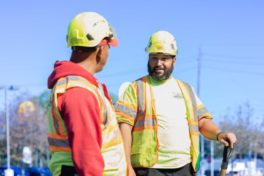 Earle American workers at job site