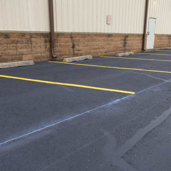Newly paved parking lot with clear lines