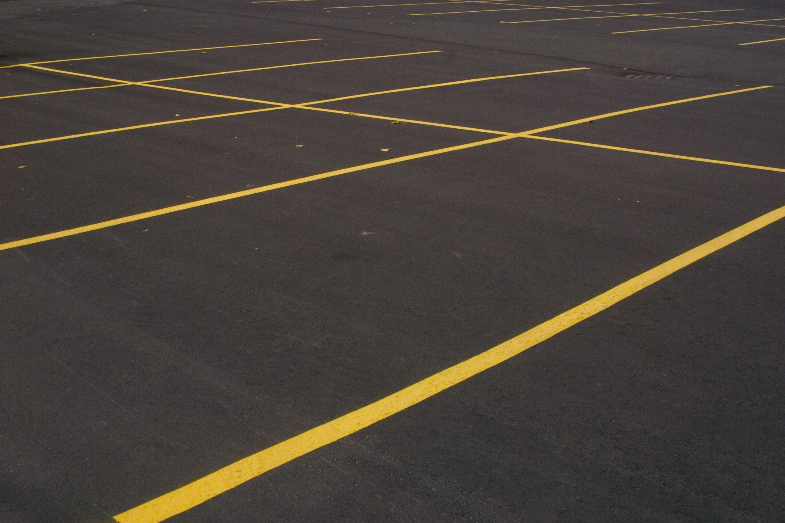 Newly paved parking lot with freshly painted lines