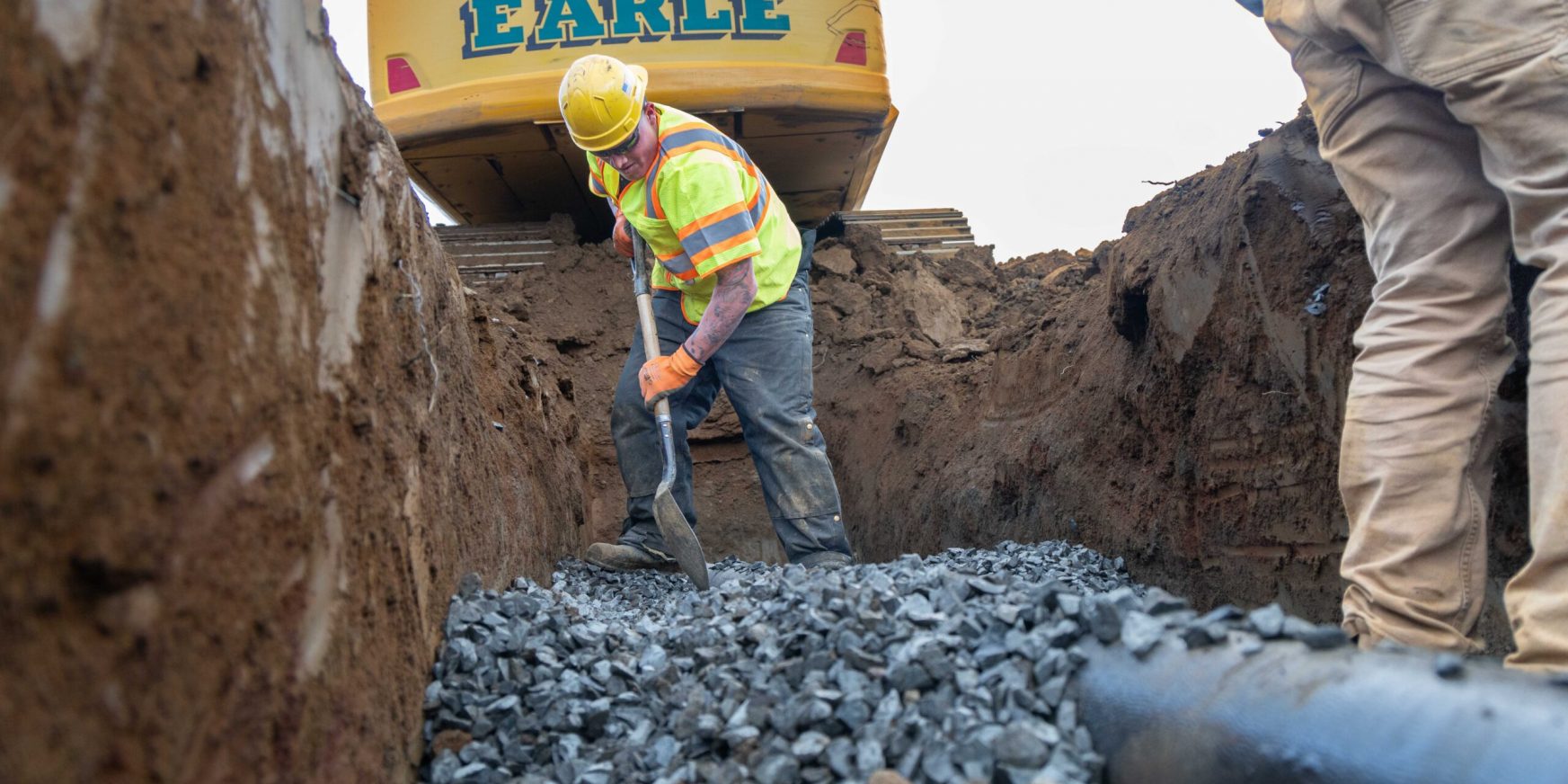 earle-american-worker-digging-at-a-construction-site
